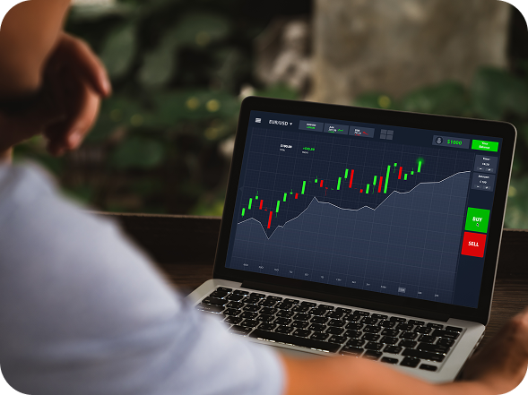 Laptop with trading chart